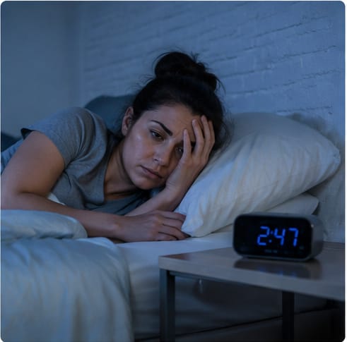 Femme eveillee dans son lit a 2h47